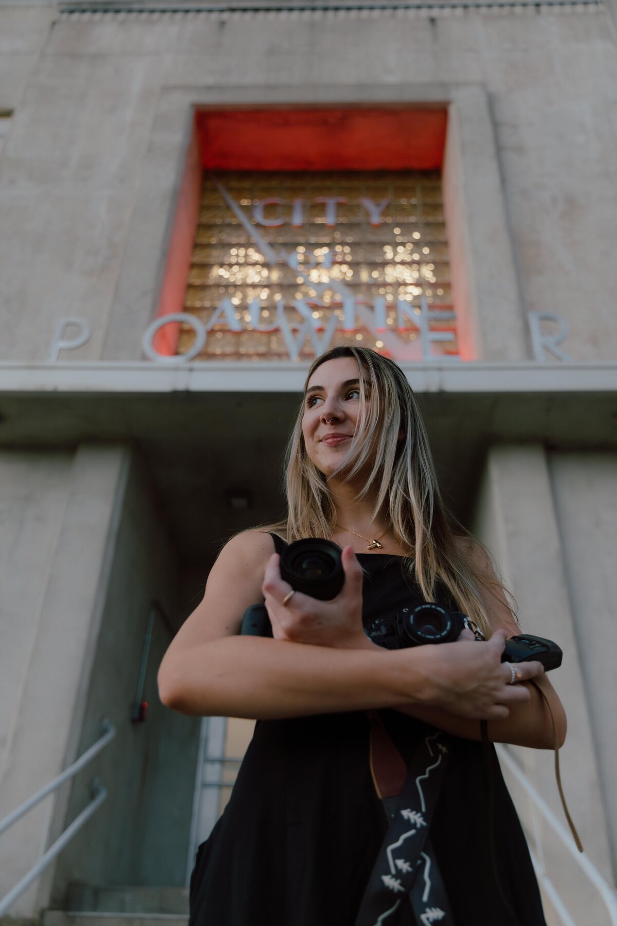 Photos by Tia is a wedding, elopement, engagement, and creative session photographer based in Austin, Texas. She offers both digital and film photography services.