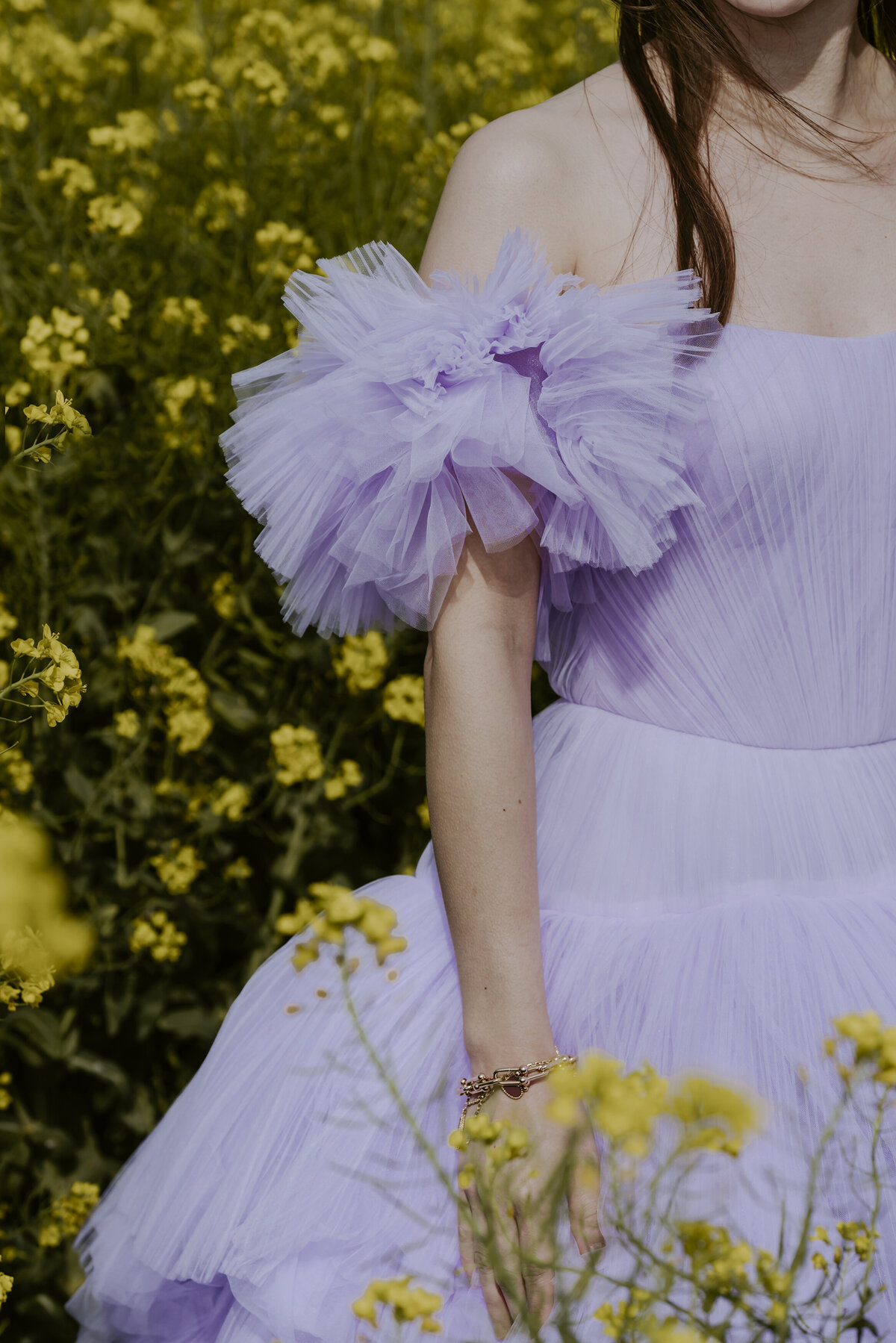 the purple raffled dress of the bride
