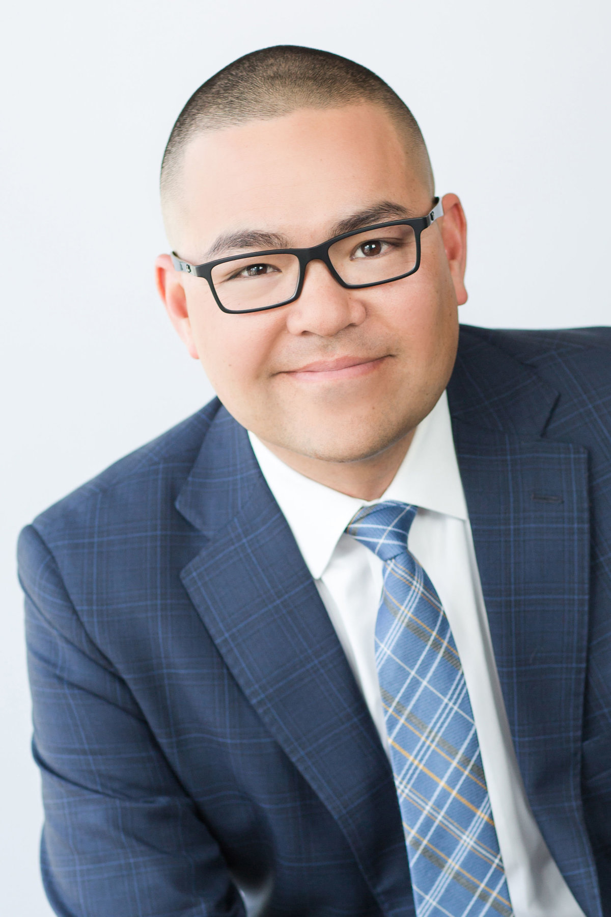 Headshot of man in suit