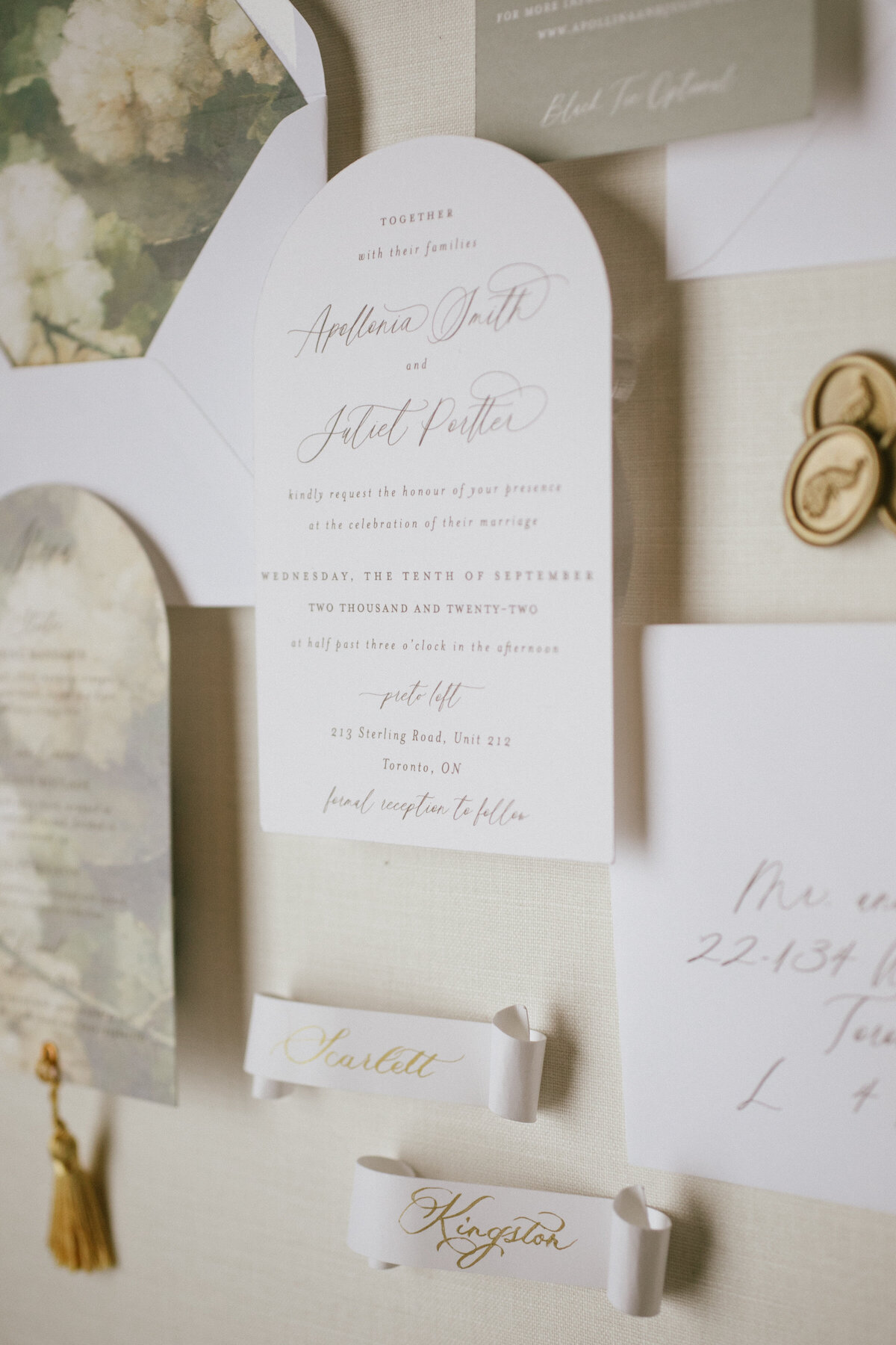Close up of arched wedding invitation