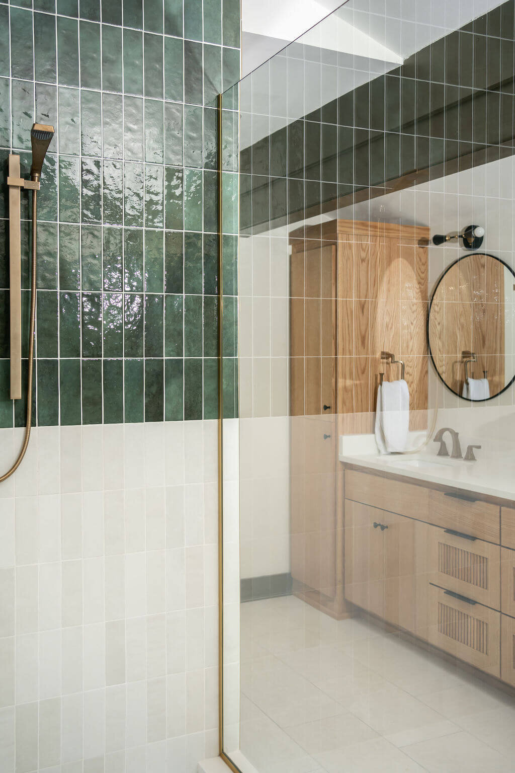 sweet southern home mid mod green tiled shower wooden vanity in bathroom