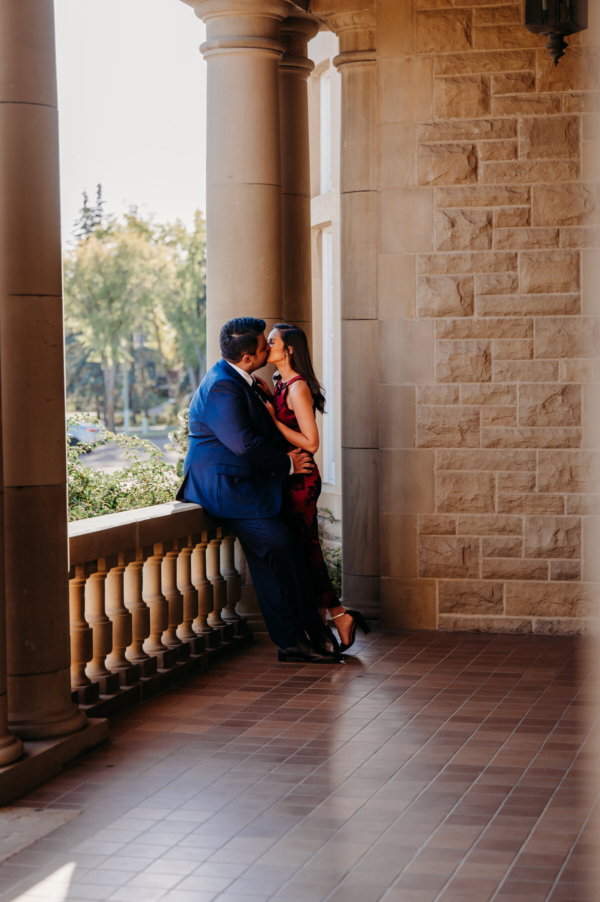Historical building in Edmonton where couple kissing on the balcony