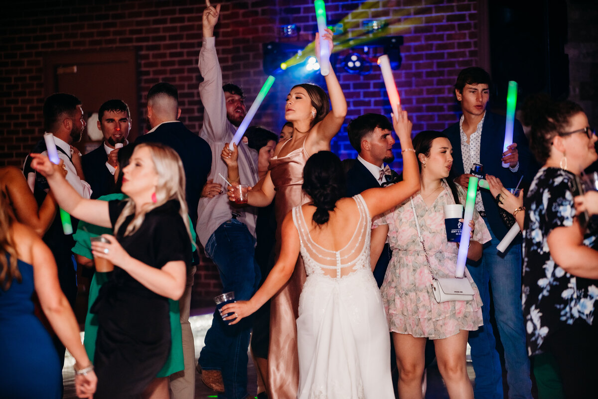 fun reception party photo with laser lights at La Louisiane in Delcambre, la