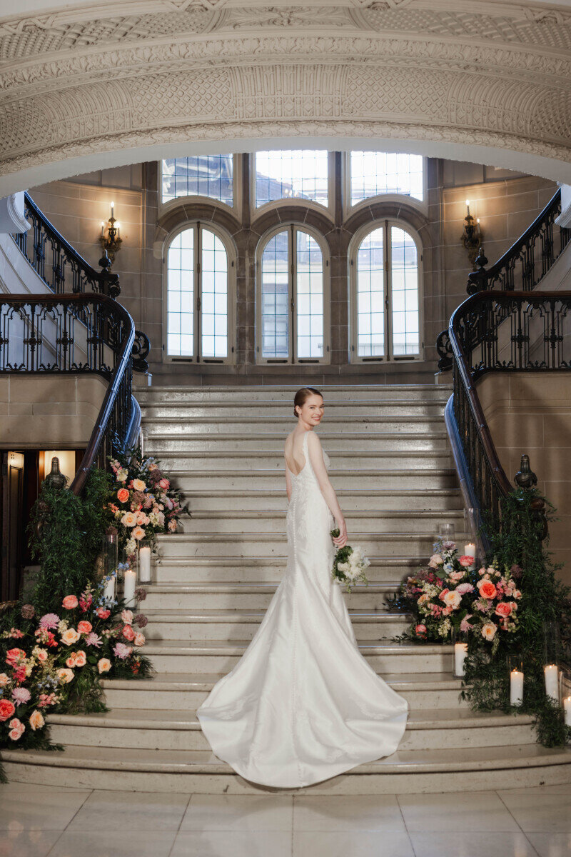 greenery candles flowers along staircase photo op