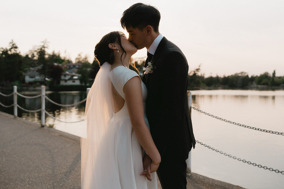 Bride and Groom kissing at Gorge park pavilion