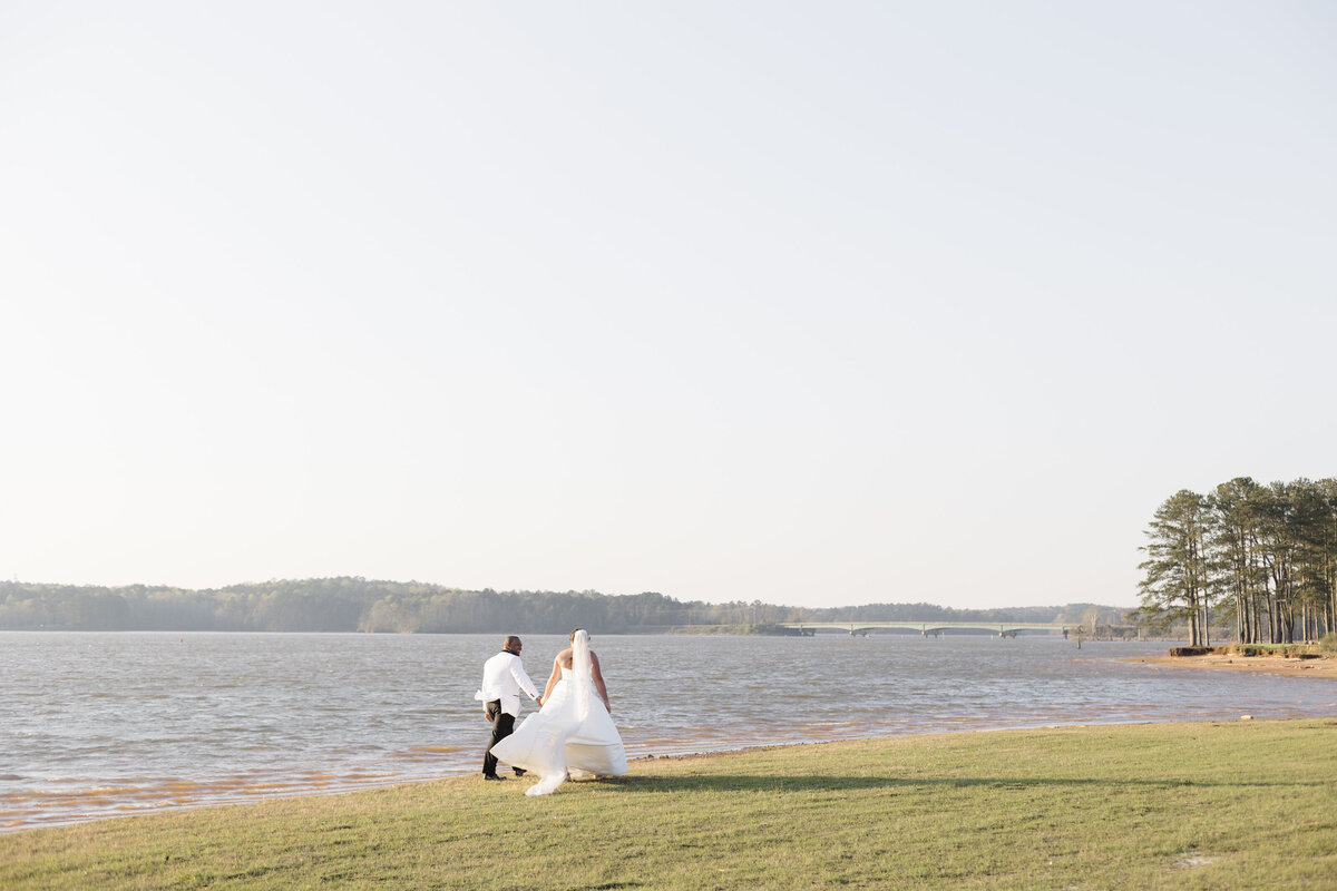 Wedding Couple Walking on Shore