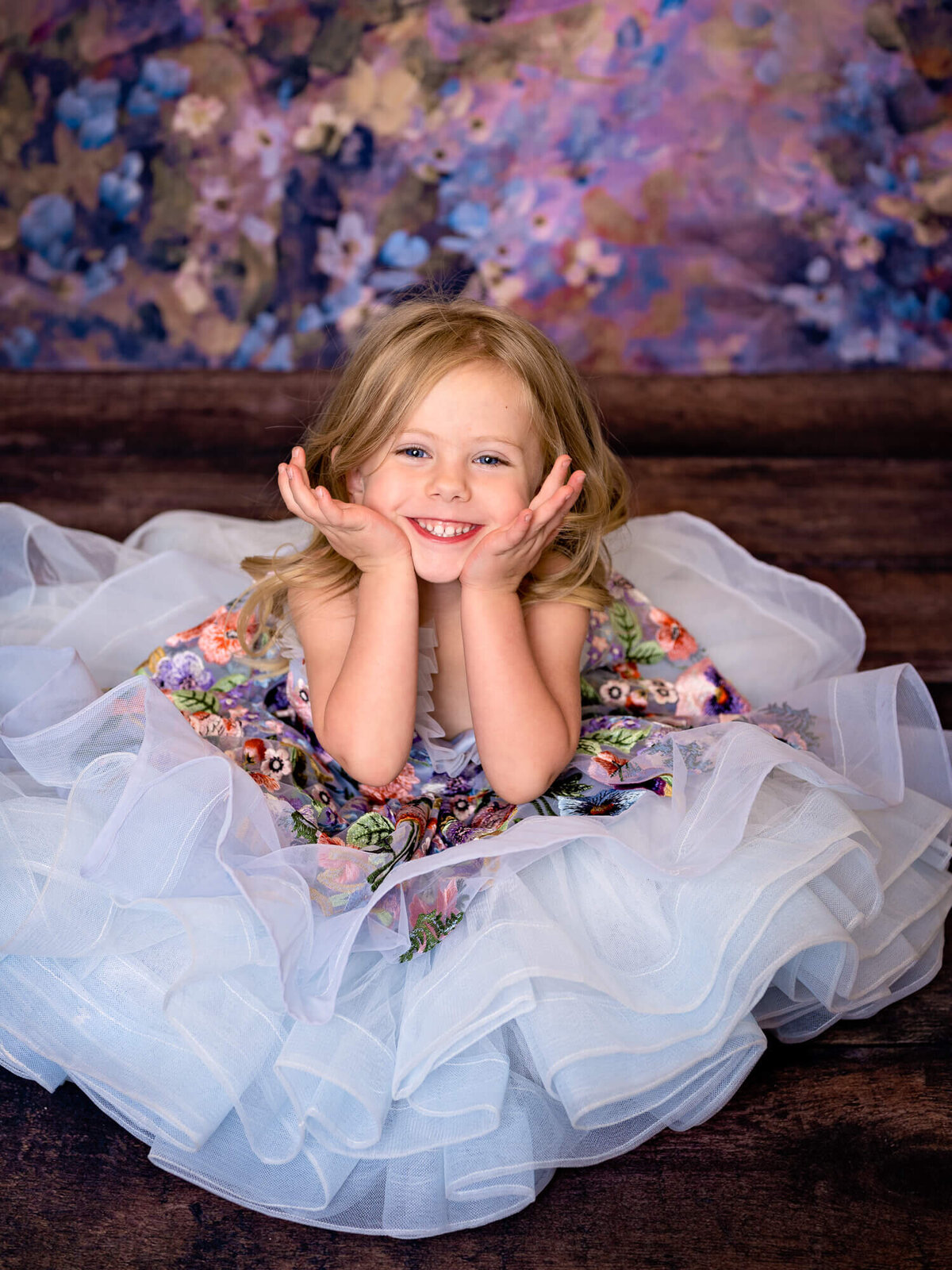 Young girl smiles in dream dress session by Prescott kids photographer Melissa Byrne