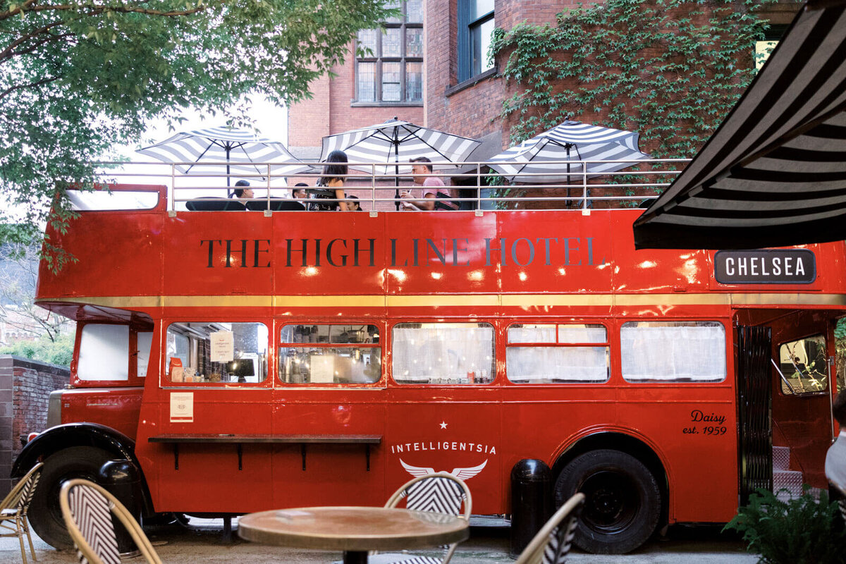 A red bus-turned restaurant at The High Line Hotel in Chelsea, NYC. Image by Jenny Fu