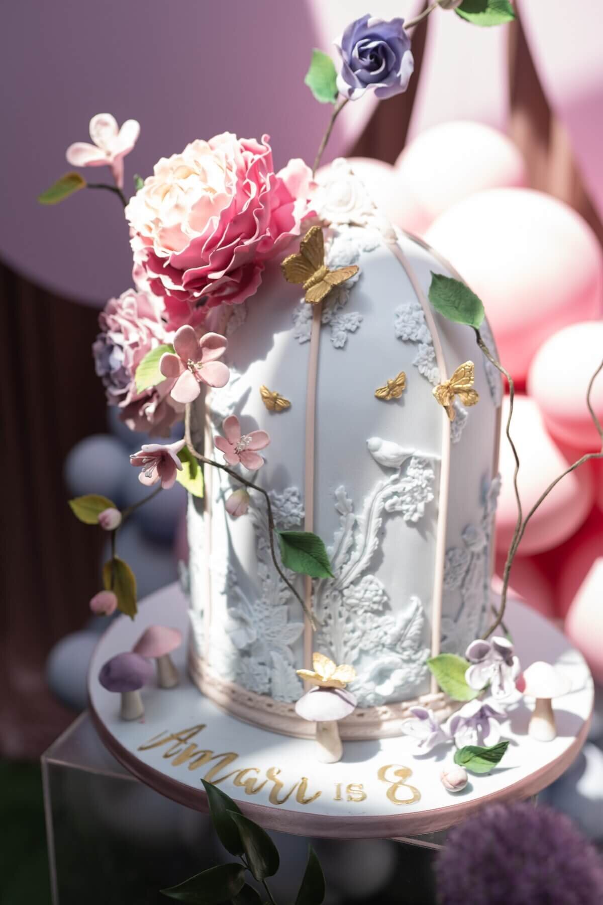 Luxury birthday cake decorated with sugar flowers