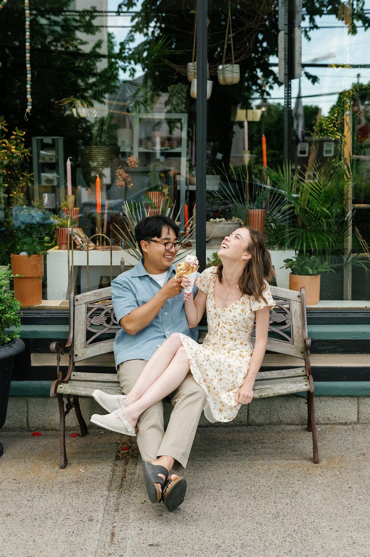 Young couple enjoy ice cream cones at the Hydrostone area in Halifax