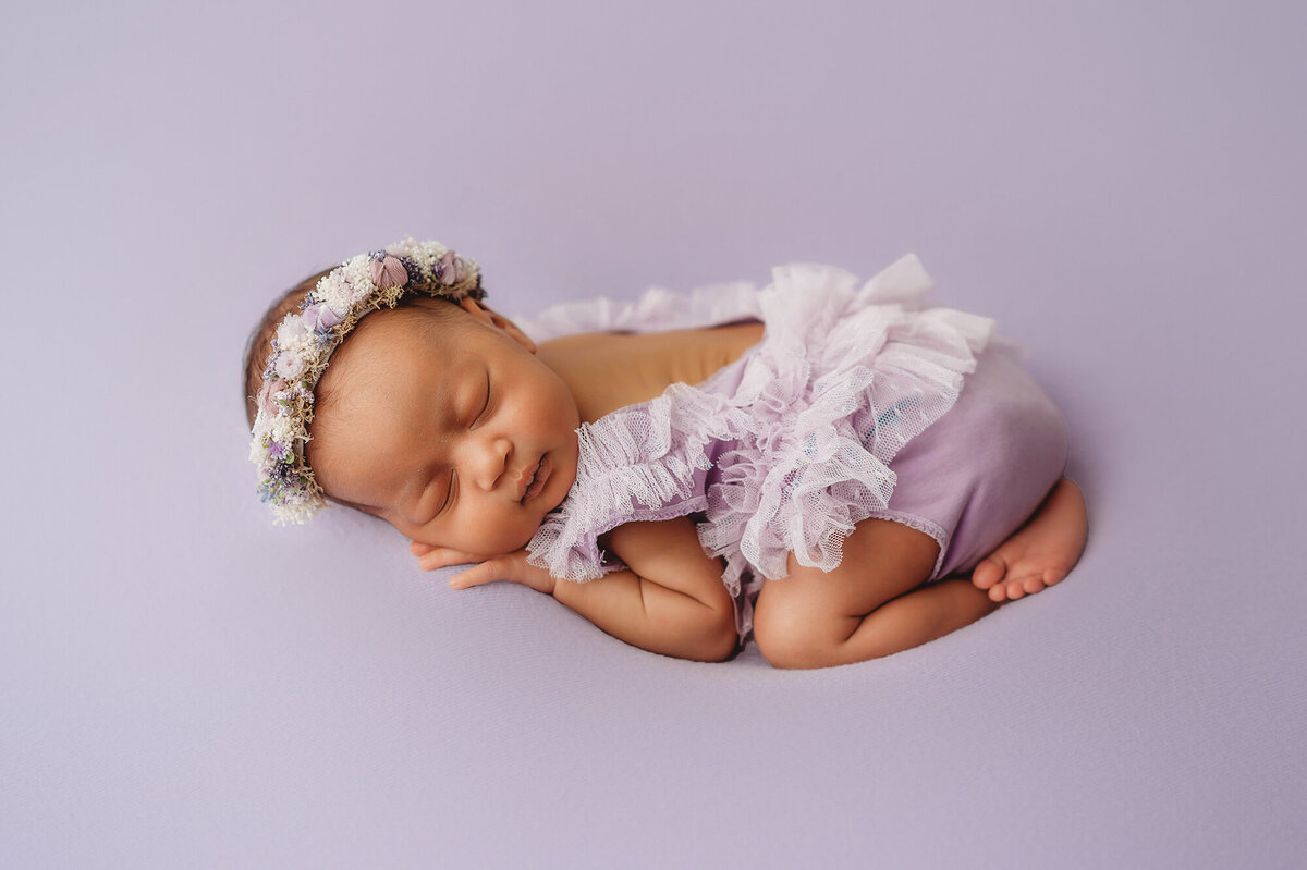 Newborn Baby Girl posed for Newborn Photography Session in Asheville.