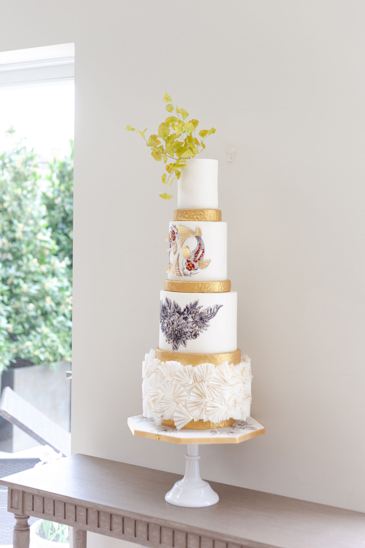 Luxury nature inspired wedding cake designer vanilla Spice Cake Studio Northamptonshire 4 tier hand painted sugar flower cake with modern textured ruffles