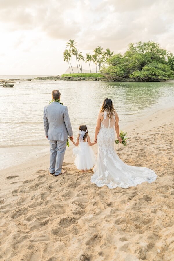 hawaii vow renewal oahu with little girl and mom and dad