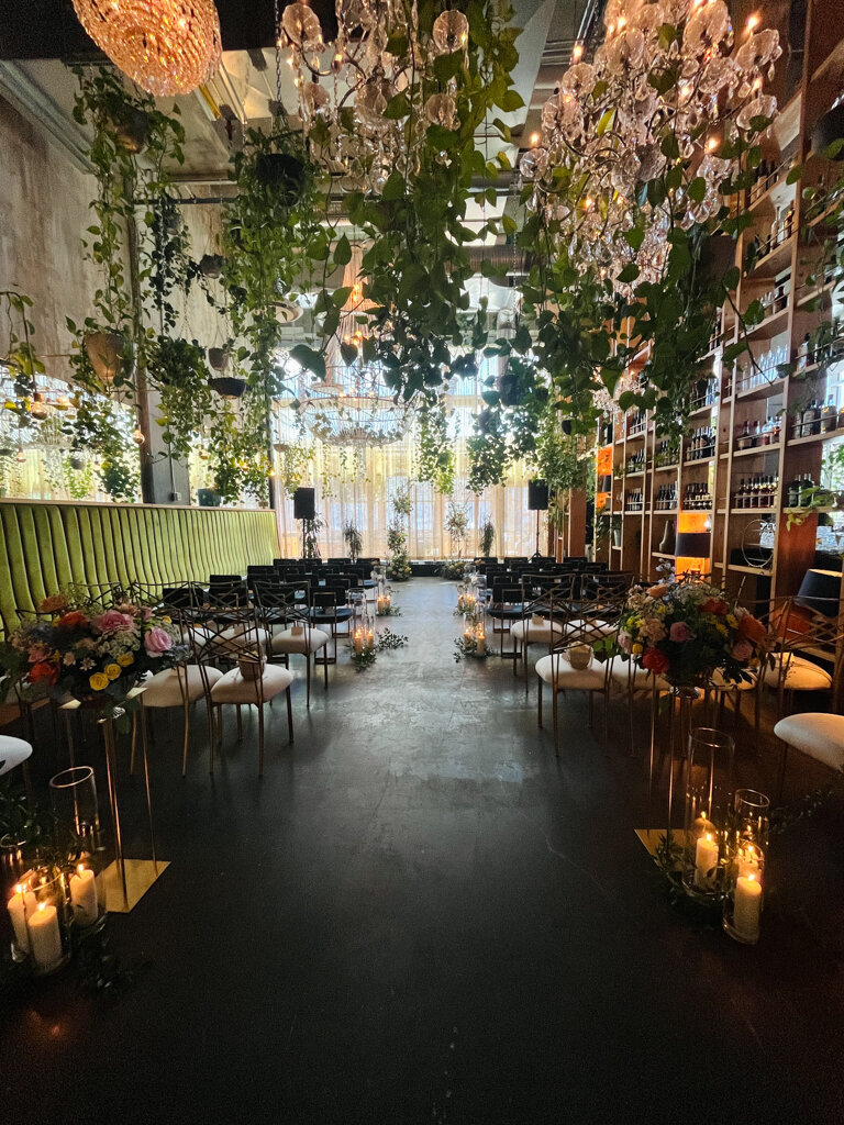 Romantic and feminine wedding ceremony floral decor by Le Bouquet, Calgary wedding florist, featured on the Brontë Bride Vendor Guide.