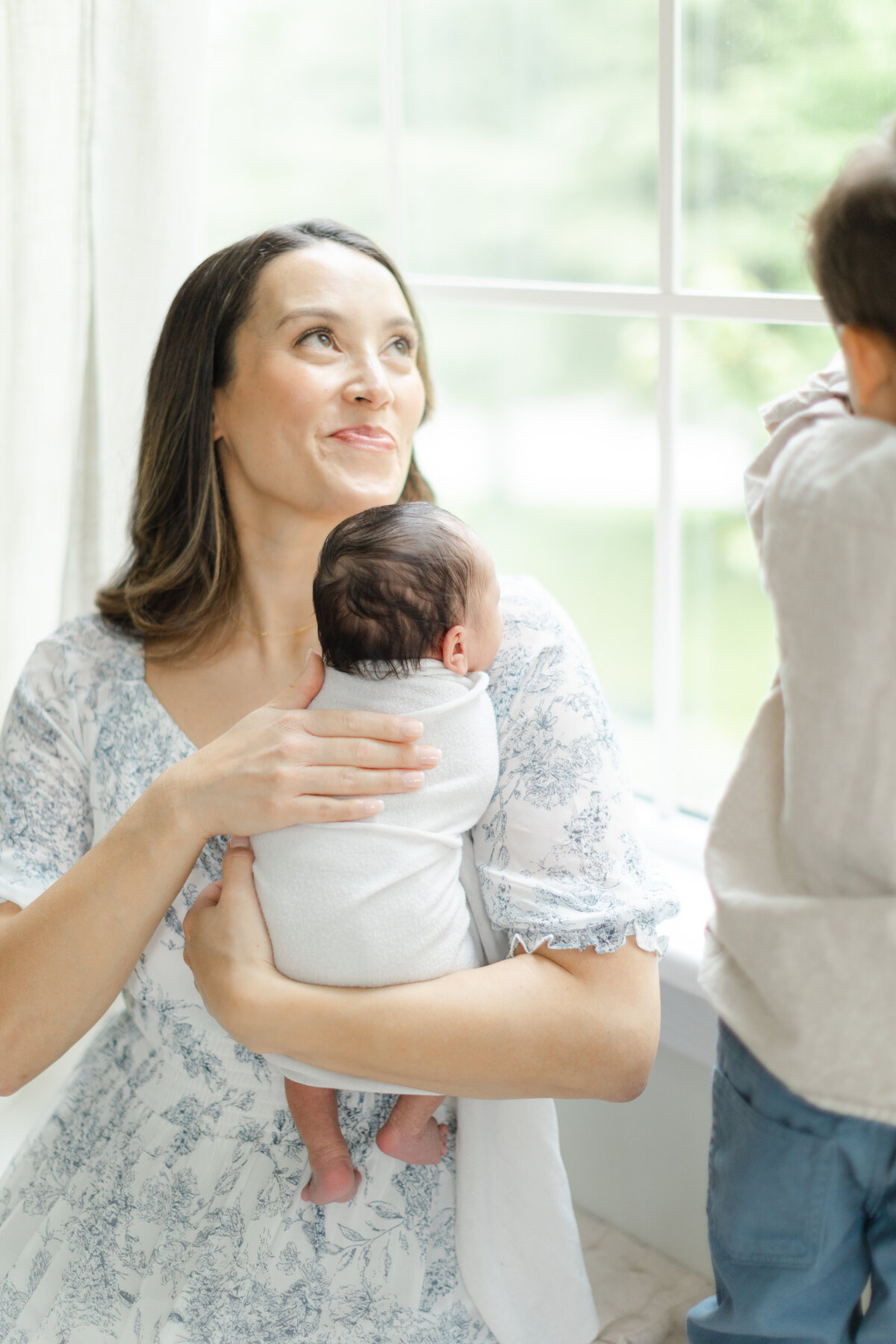 Newborn photography session with siblings at a Philadelphia photography studio - 8