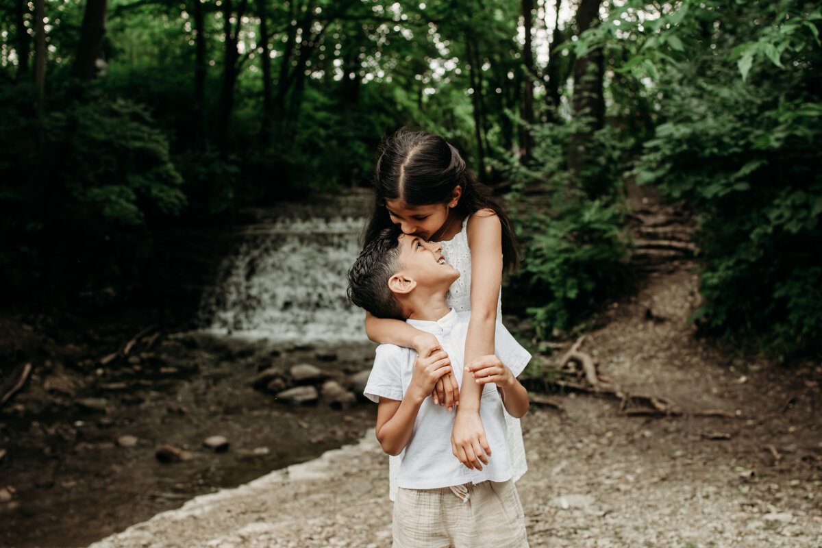 Siblings by a creek photo in South Elgin, IL, by Moments by Meli