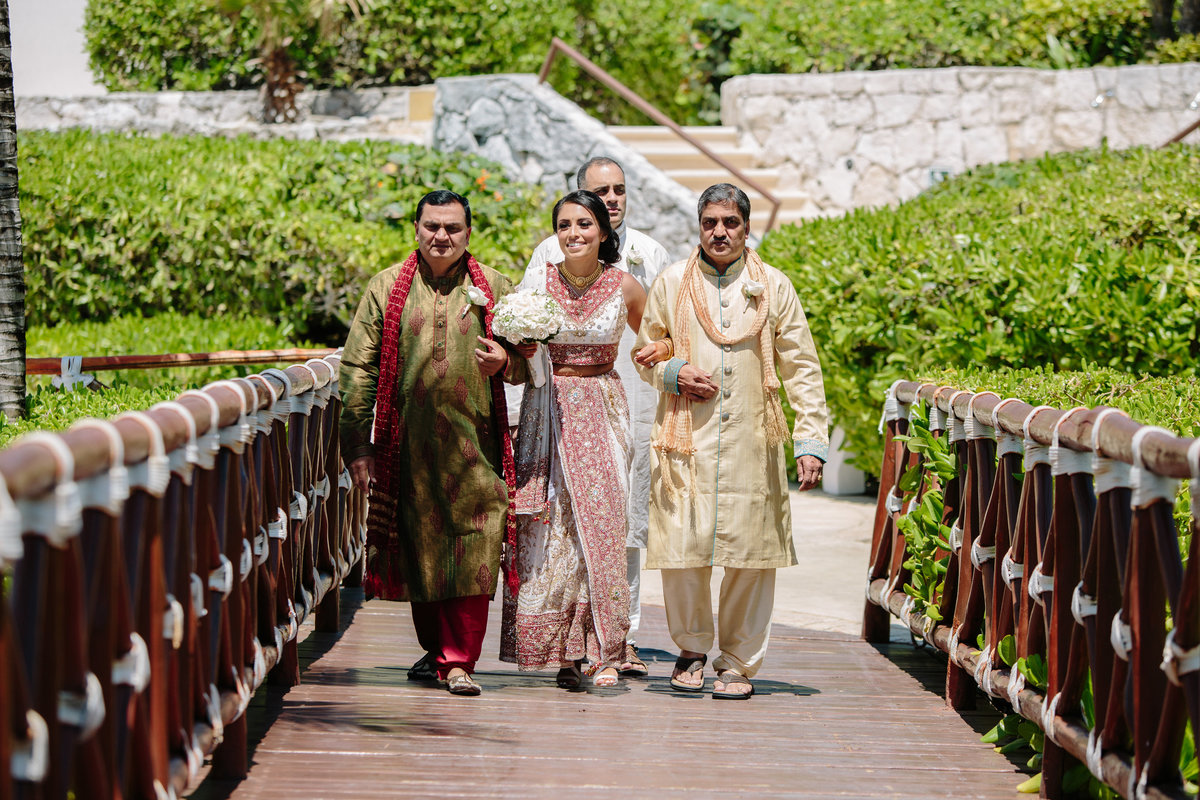 A multi day destination wedding in Mexico with Christian and Hindu influences, all set at the Hard Rock Riviera Maya.