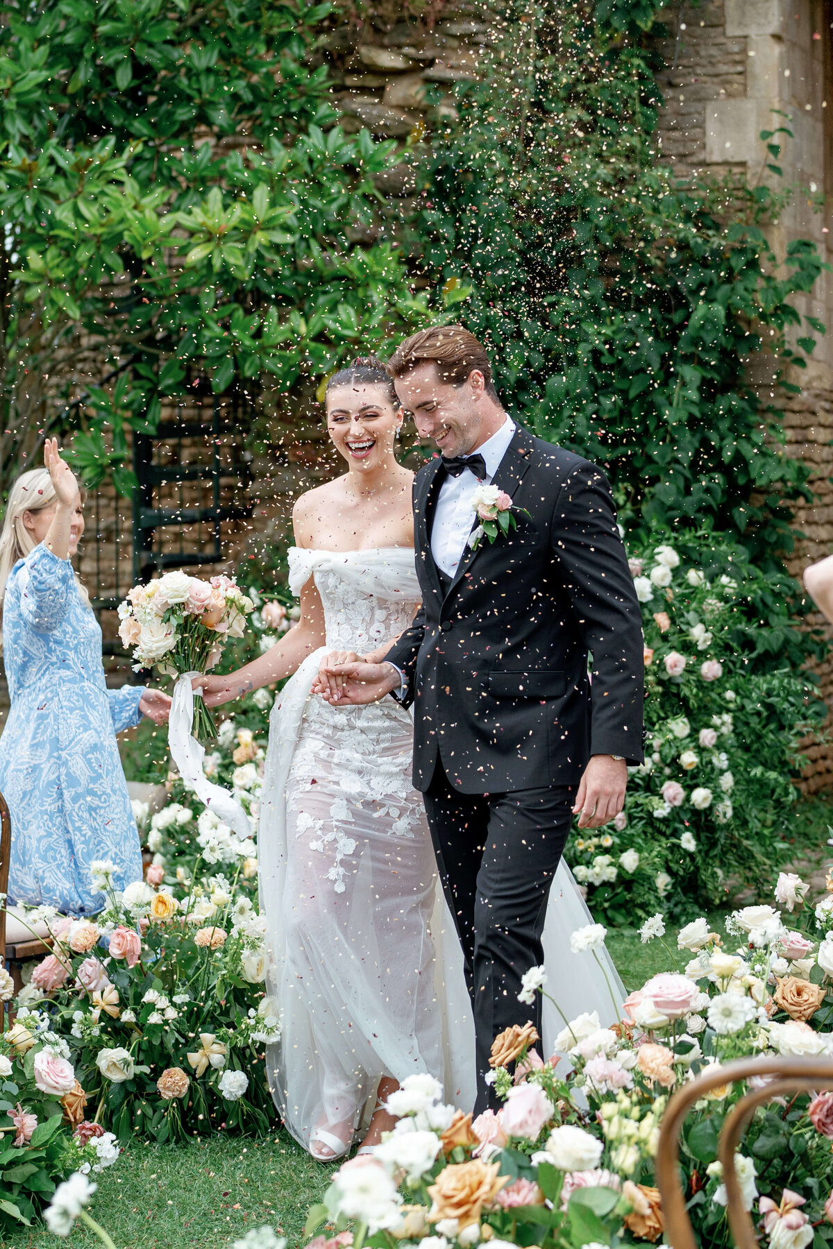 Wedding ceremony outdoors in the garden at Euridge Manor