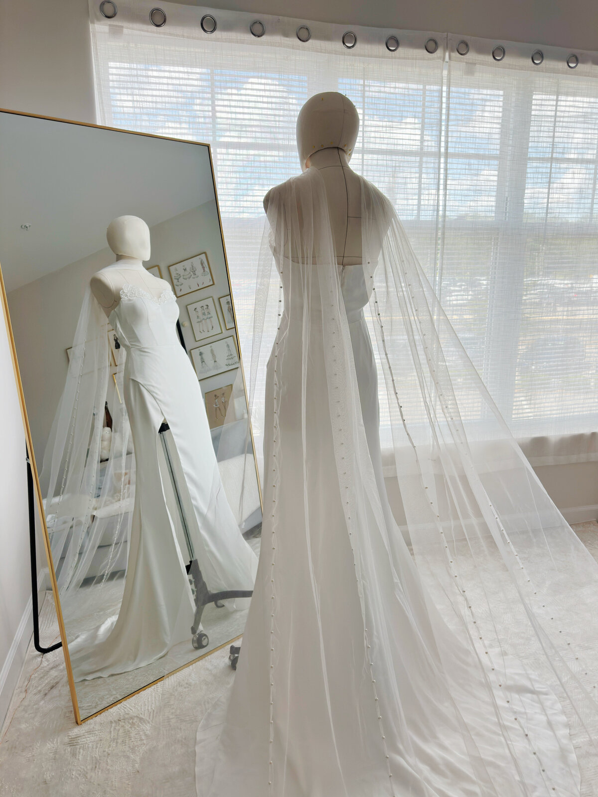 Soft bridal scarf draping beautifully with pearl details for a sophisticated finish
