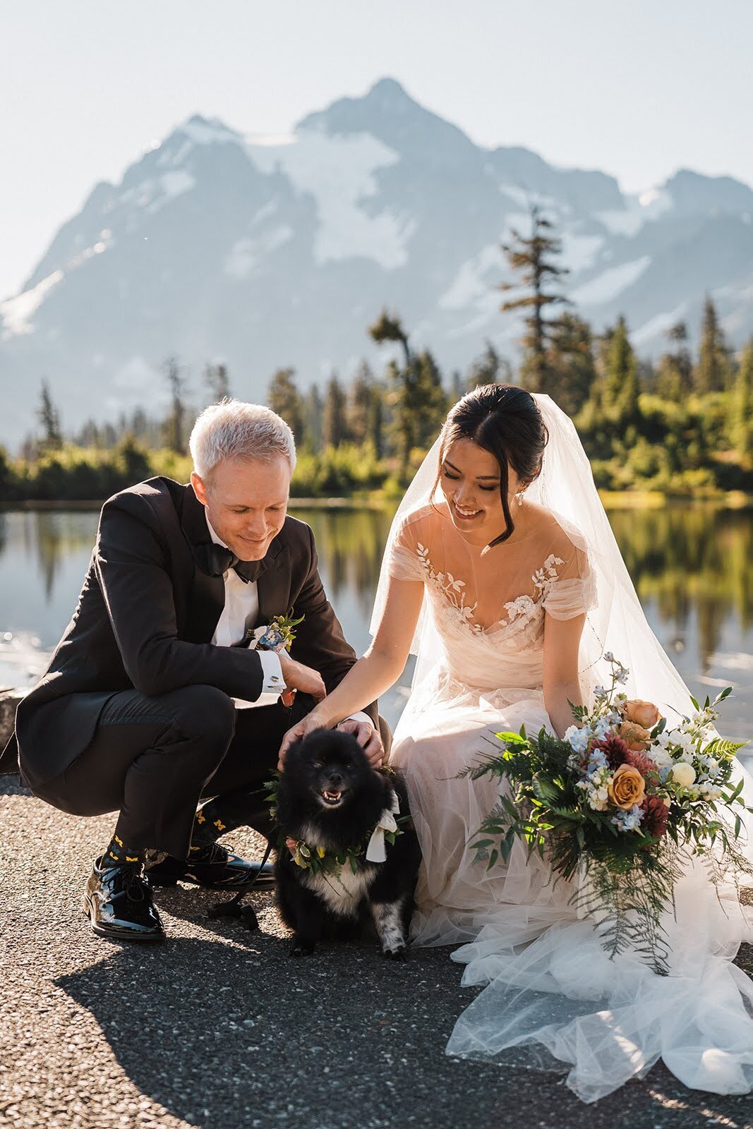 Bride & groom with their Pomeranian during elopement at Picture Lake in the North Cascades! 