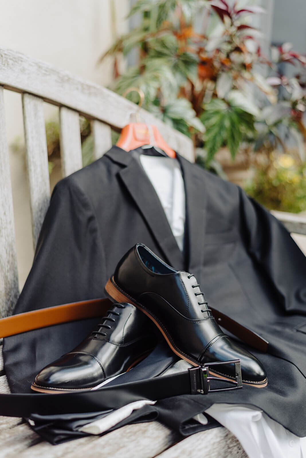 grooms suit and wedding shoes