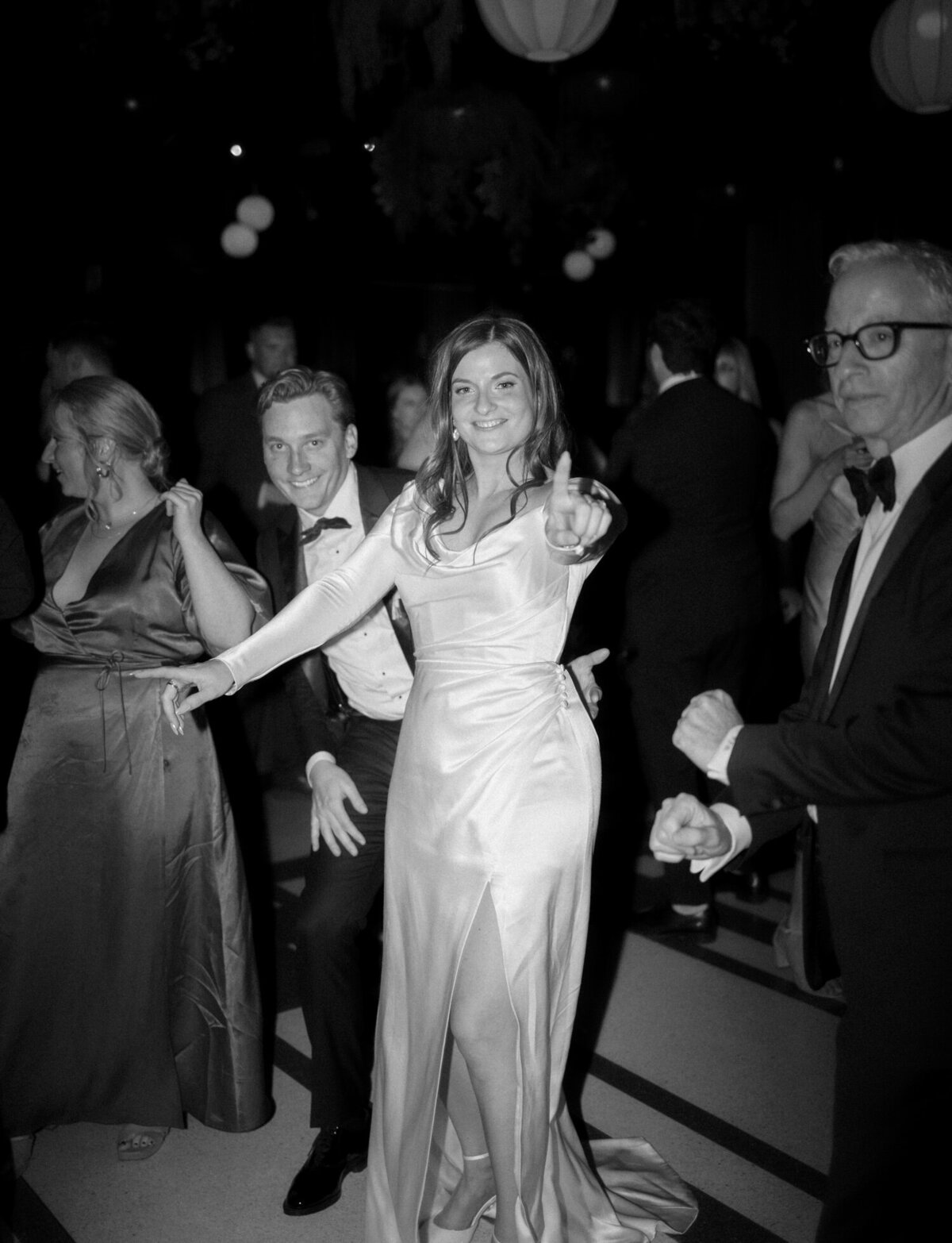 candid dance floor moments at Shinola Hotel captured by Detroit wedding photographer Christina Harrison