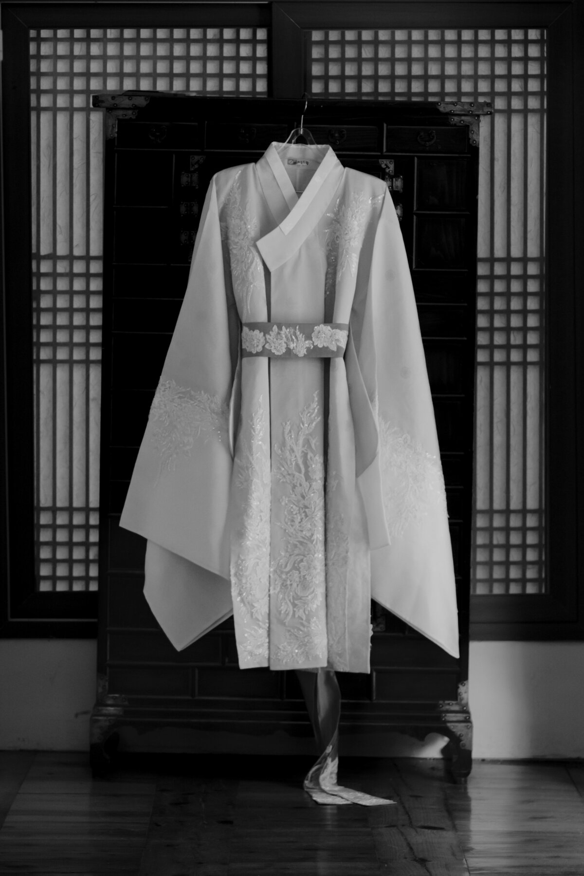 bridal hanbok hung in traditional hanok in seoul
