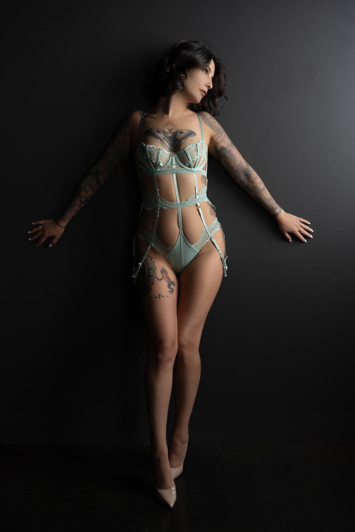 photo of woman in mint green lingerie