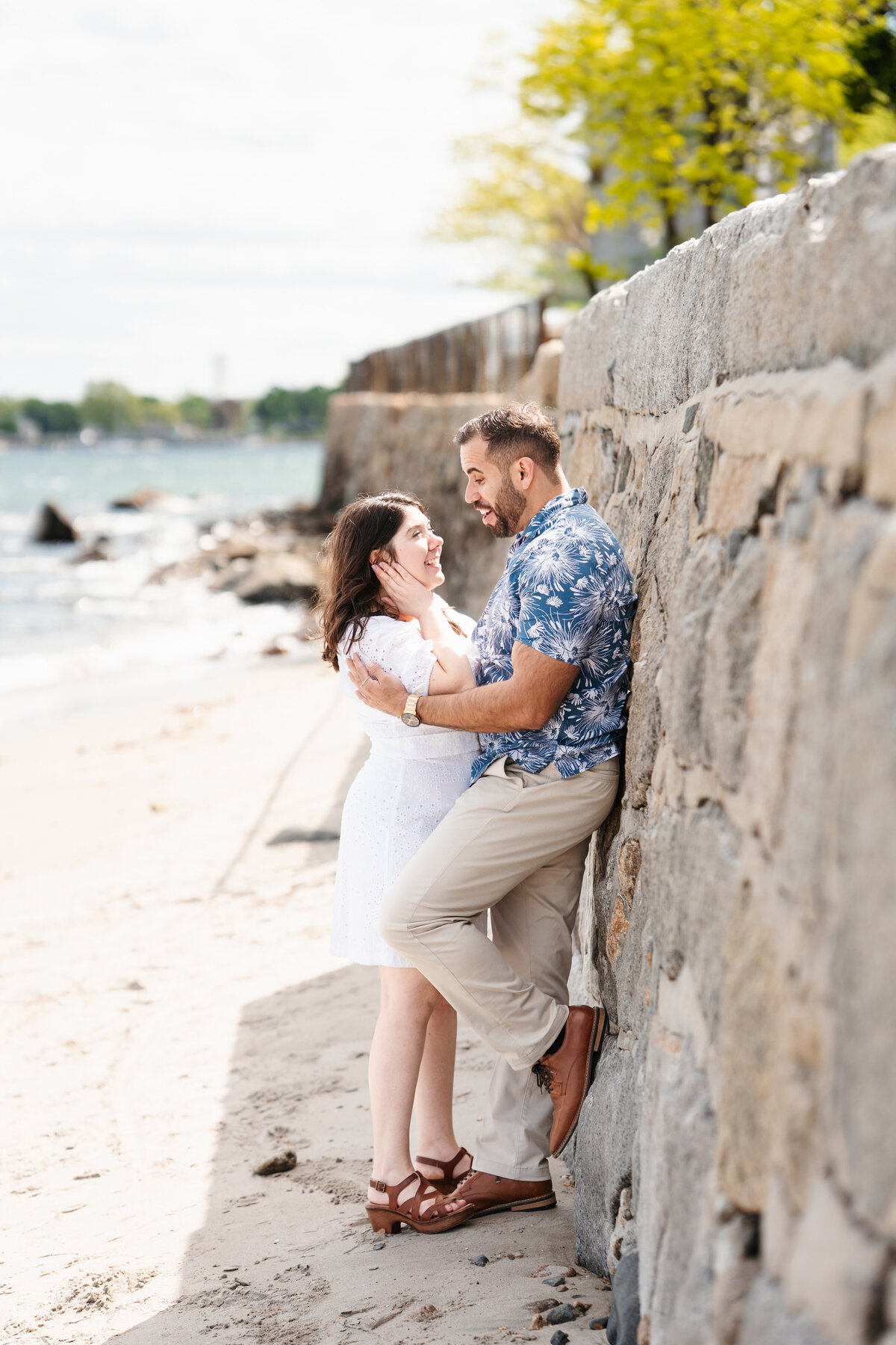 Couple walking through the rose garden at Lynch Park during their Beverly engagement session with Danielle Littles Photography