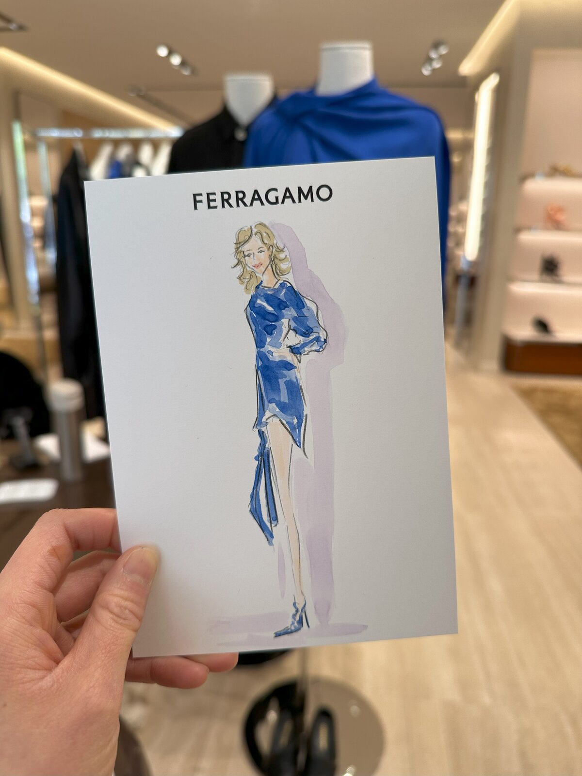 Luxury event entertainment - on-site fashion illustrations at Ferragamo activation, engaging clients with custom sketches.