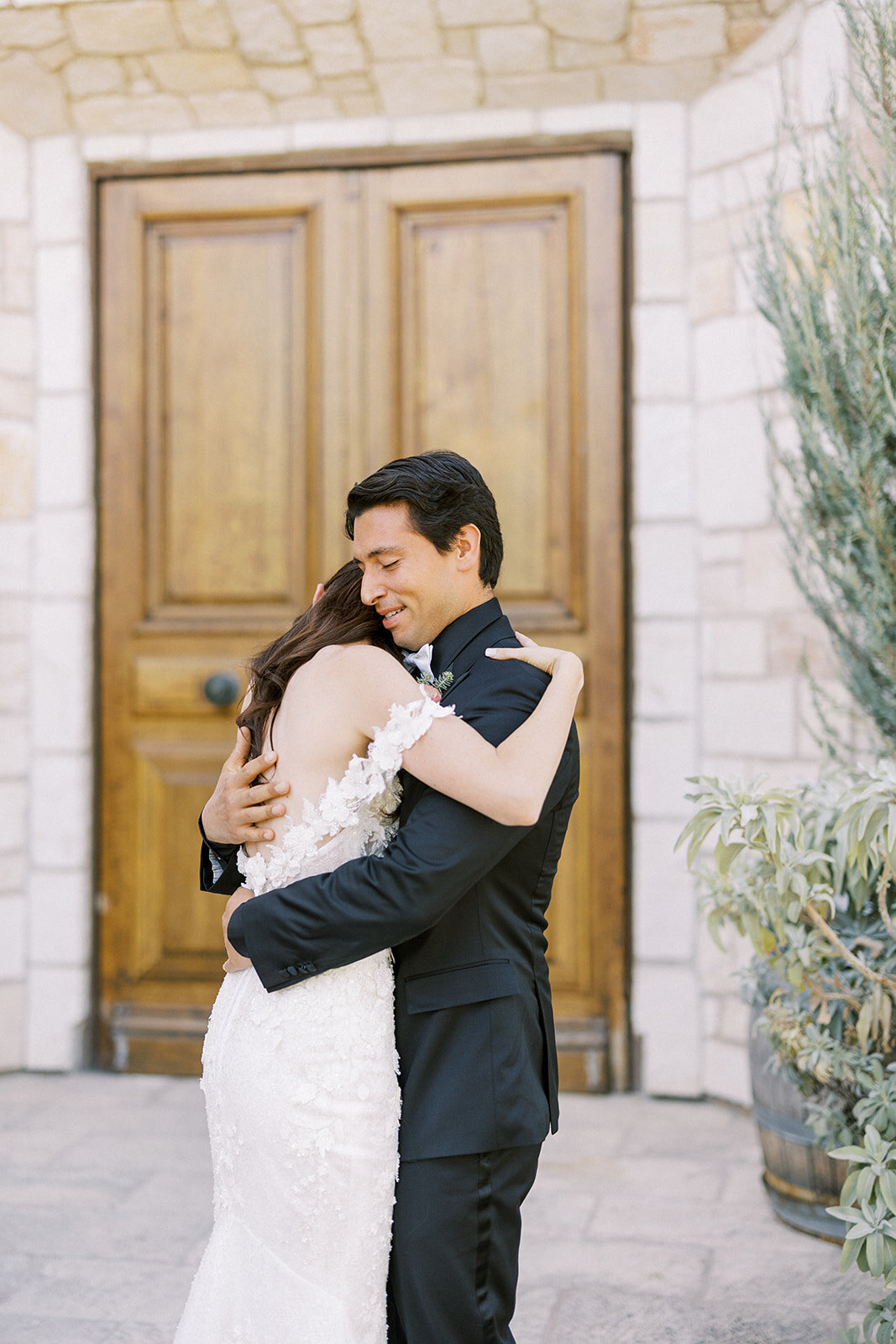 Emotional first look between bride and groom—intimate, heartfelt, and full of love in a romantic vineyard setting.