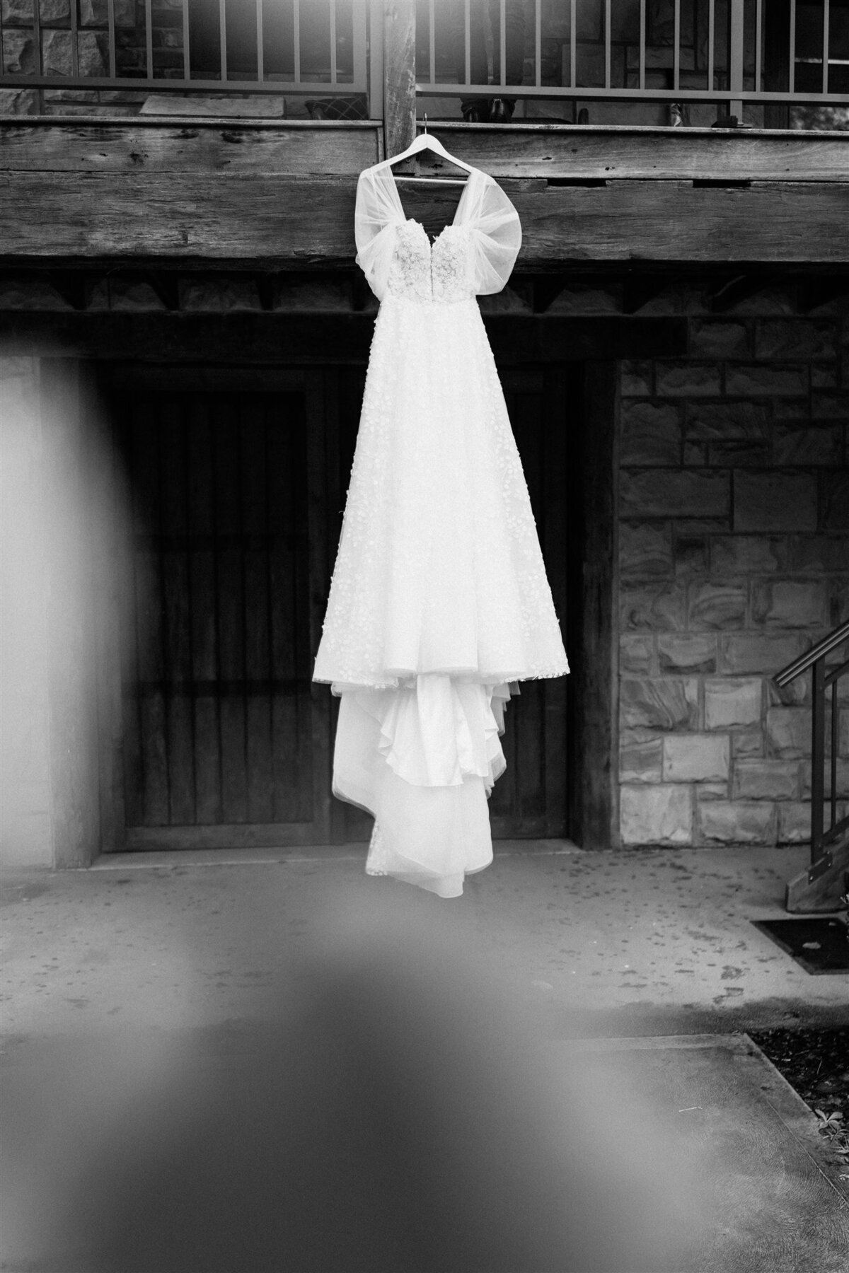 Explore stunning black and white detailed shots of exquisite wedding dresses, capturing timeless elegance and intricate craftsmanship.