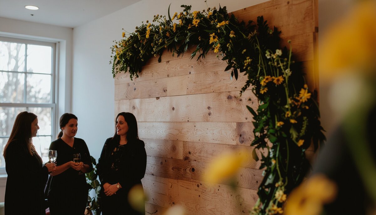 Firefly_yellow wildflowers and greenery arch in front of a stylish wooden feature wall, at a  547707