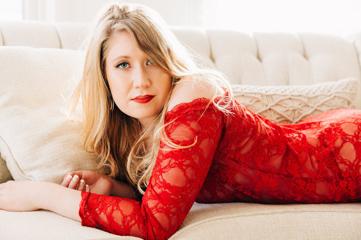 Boudoir photo of Missoula woman wearing red lace lingerie