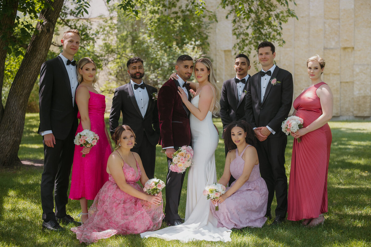pink bridal party at the legislature grounds in Edmonton