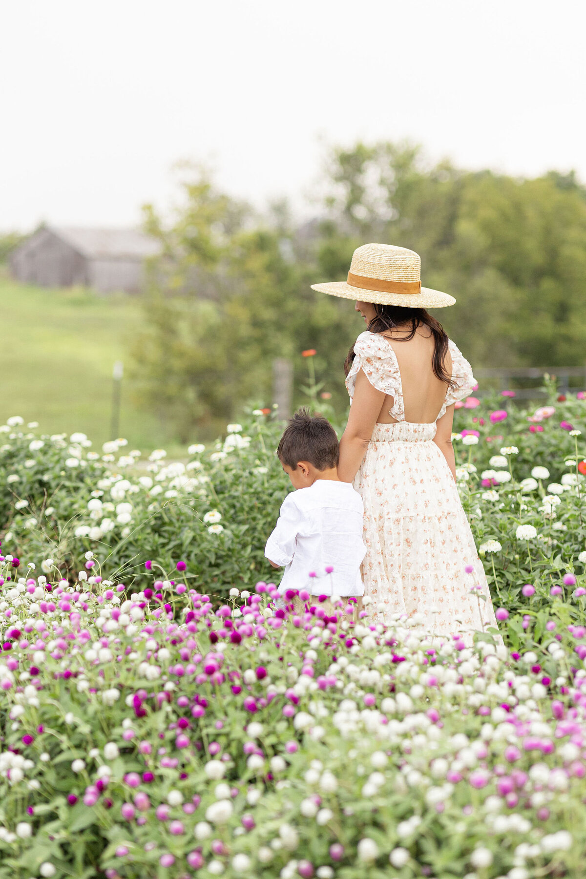 mom walking with boy at Chickapoo farm