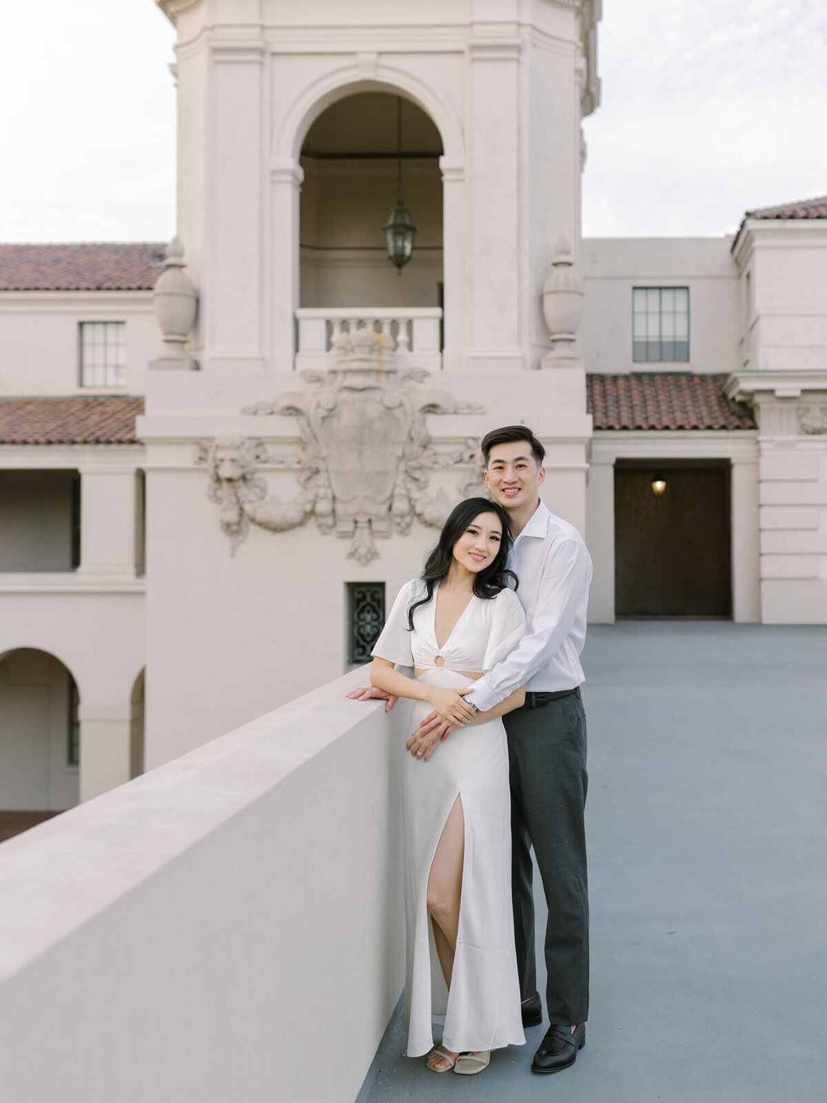 cloudy day engagement photo of couple at pasadena city hall