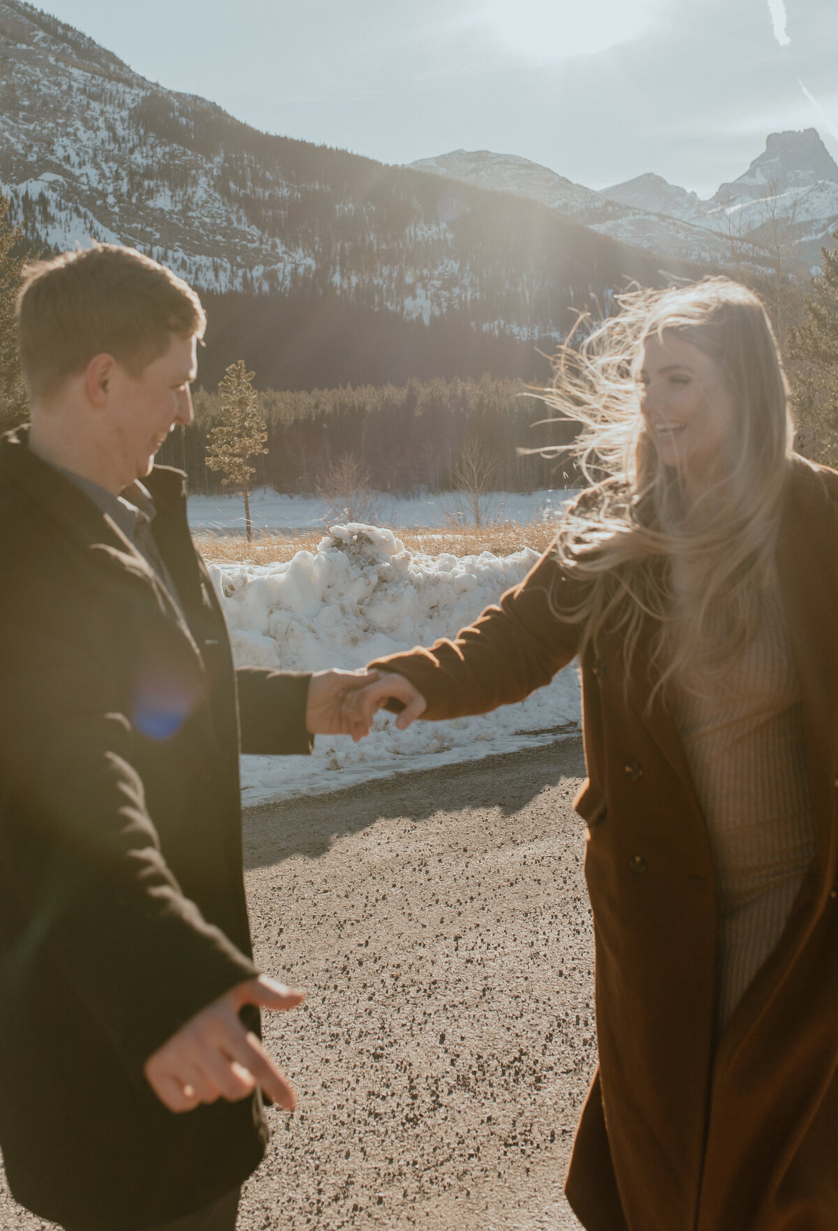 fun winter engagement session in the mountains
