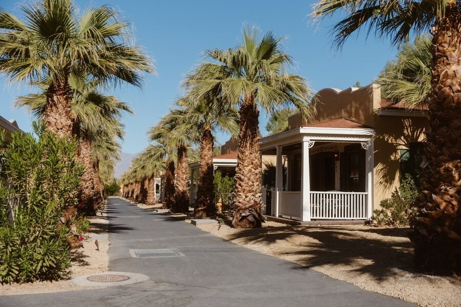 View of the Ranch cottages and palm trees lining the street