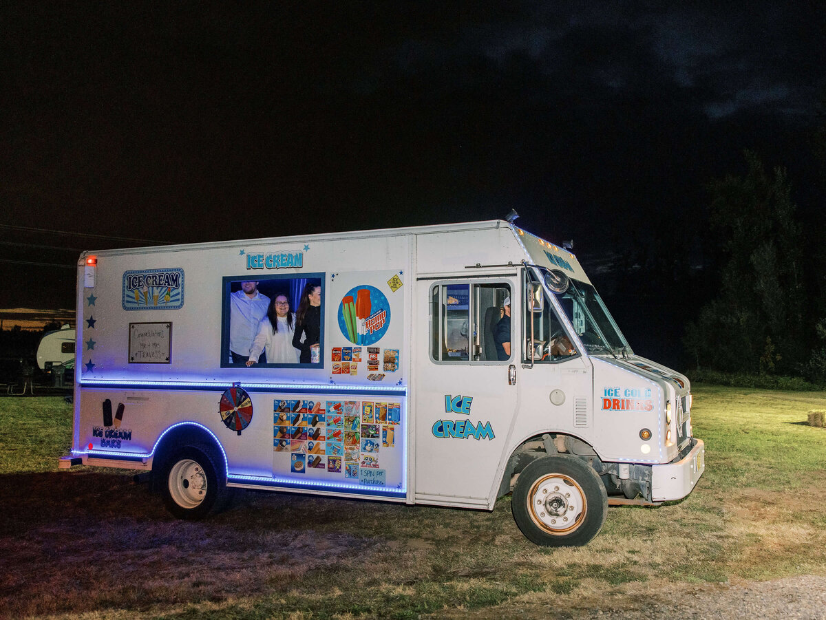 Main Street Sweets ice cream truck serves ice cream at a luxury outdoor wedding reception.