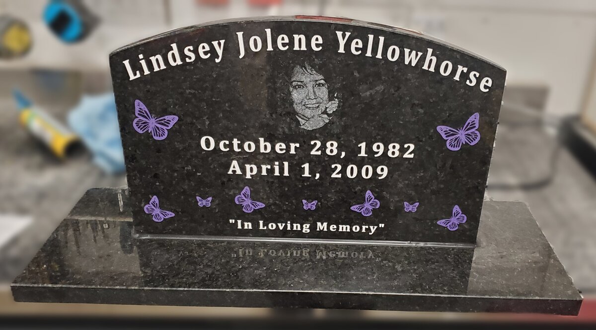 woman headstone butterfly engraved design idea