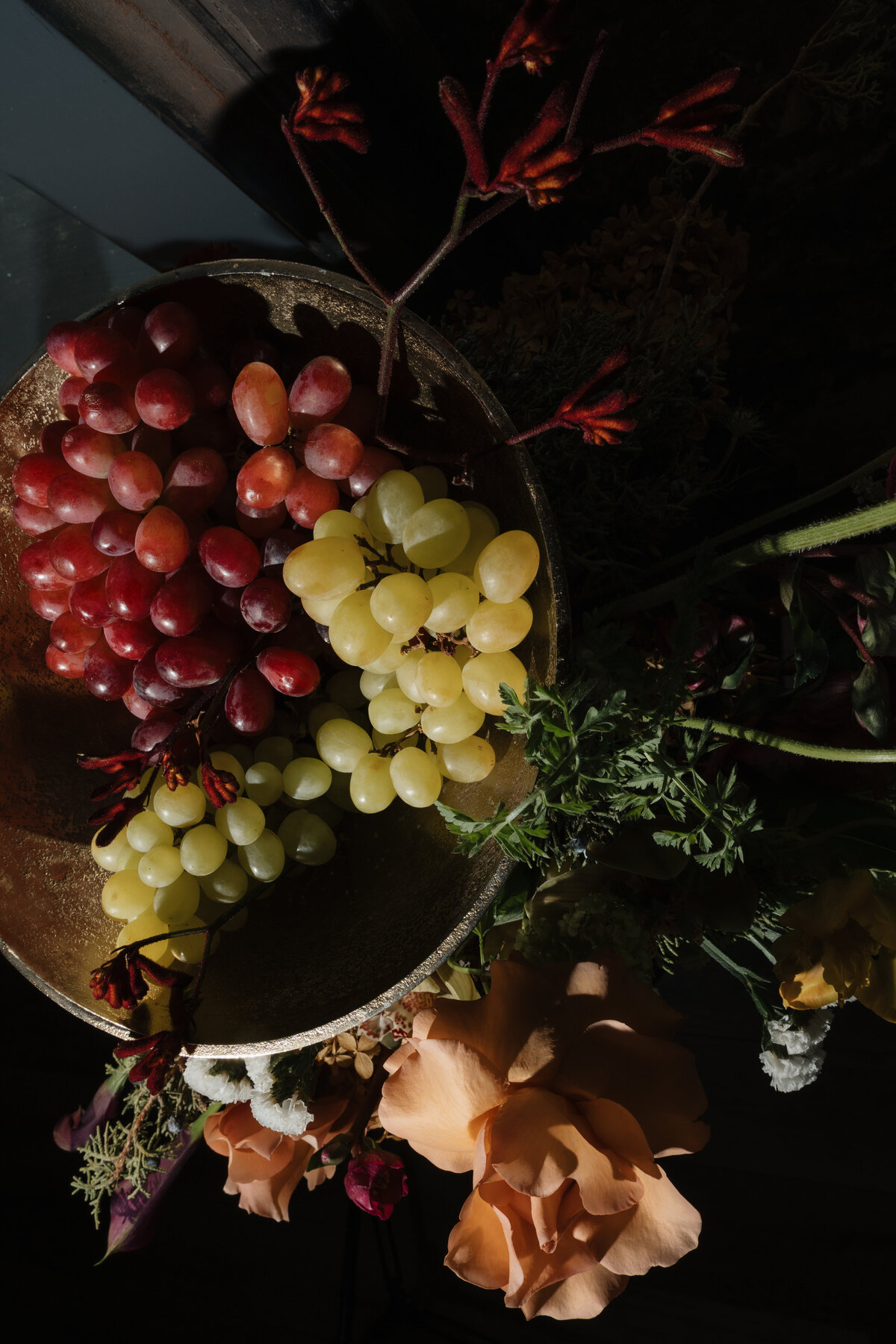 Fruit and floral arrangement by Daffodil Parker Q Jancola