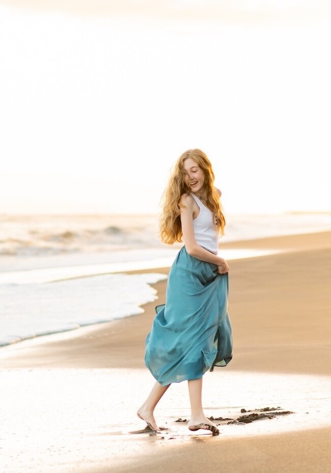 Kauai senior portrait photographers - Karma Hill Photography - Girl walking on the beach