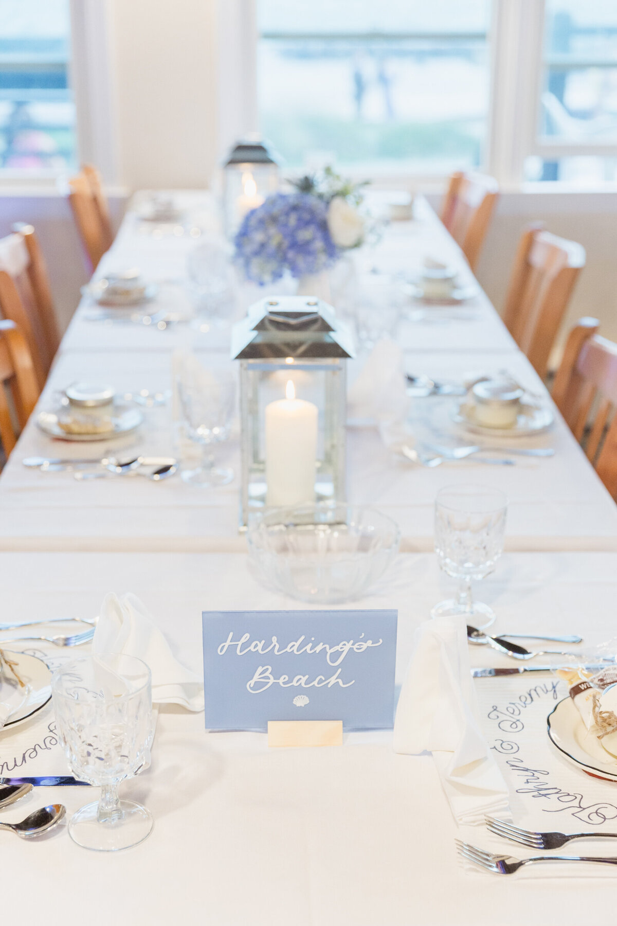 A white and blue beach wedding on Cape Cod