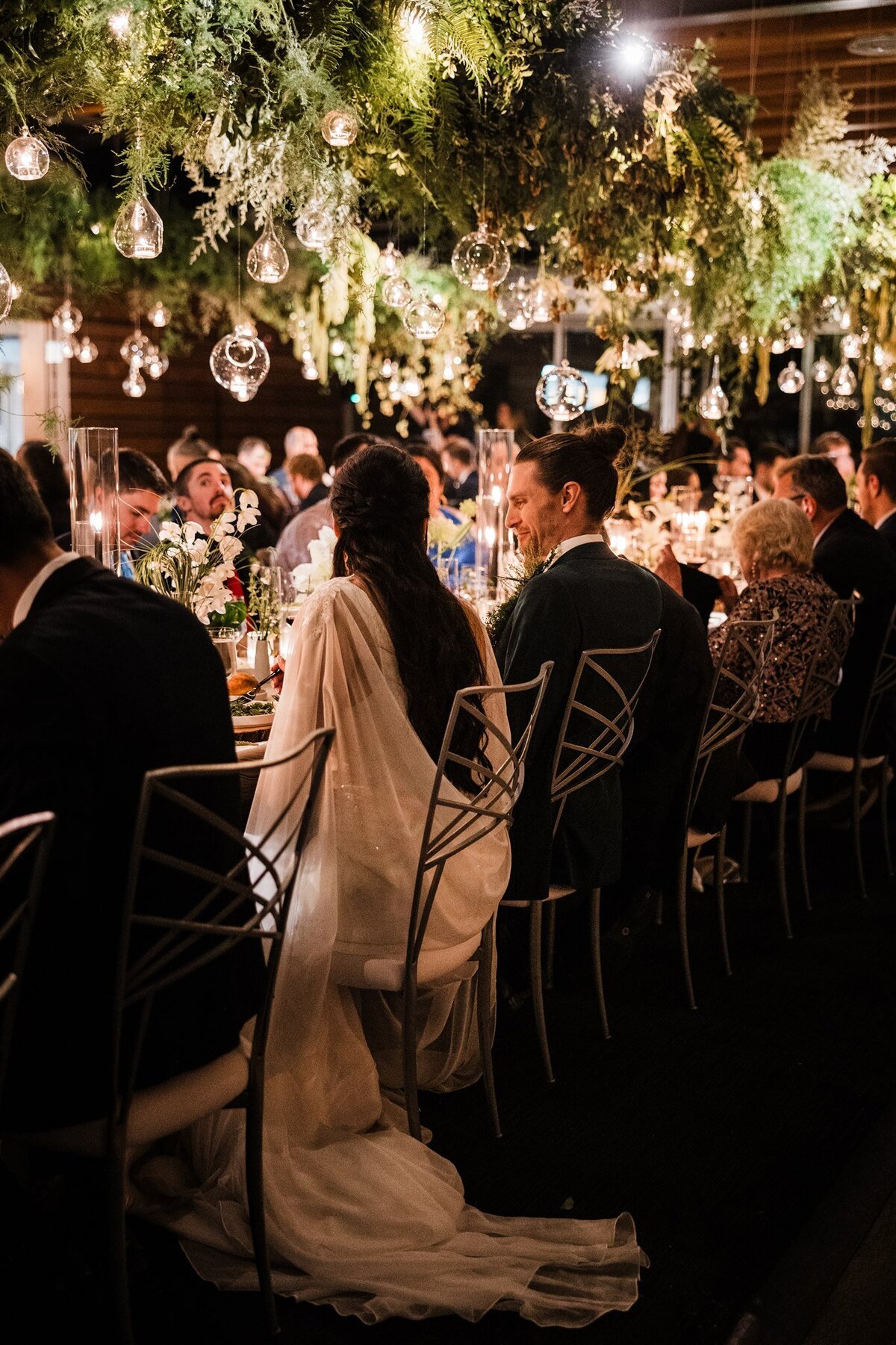Dramatic-Ceiling-Greenery-Candle-Light-Wedding-Flora-Nova-Design-Seattle-00100