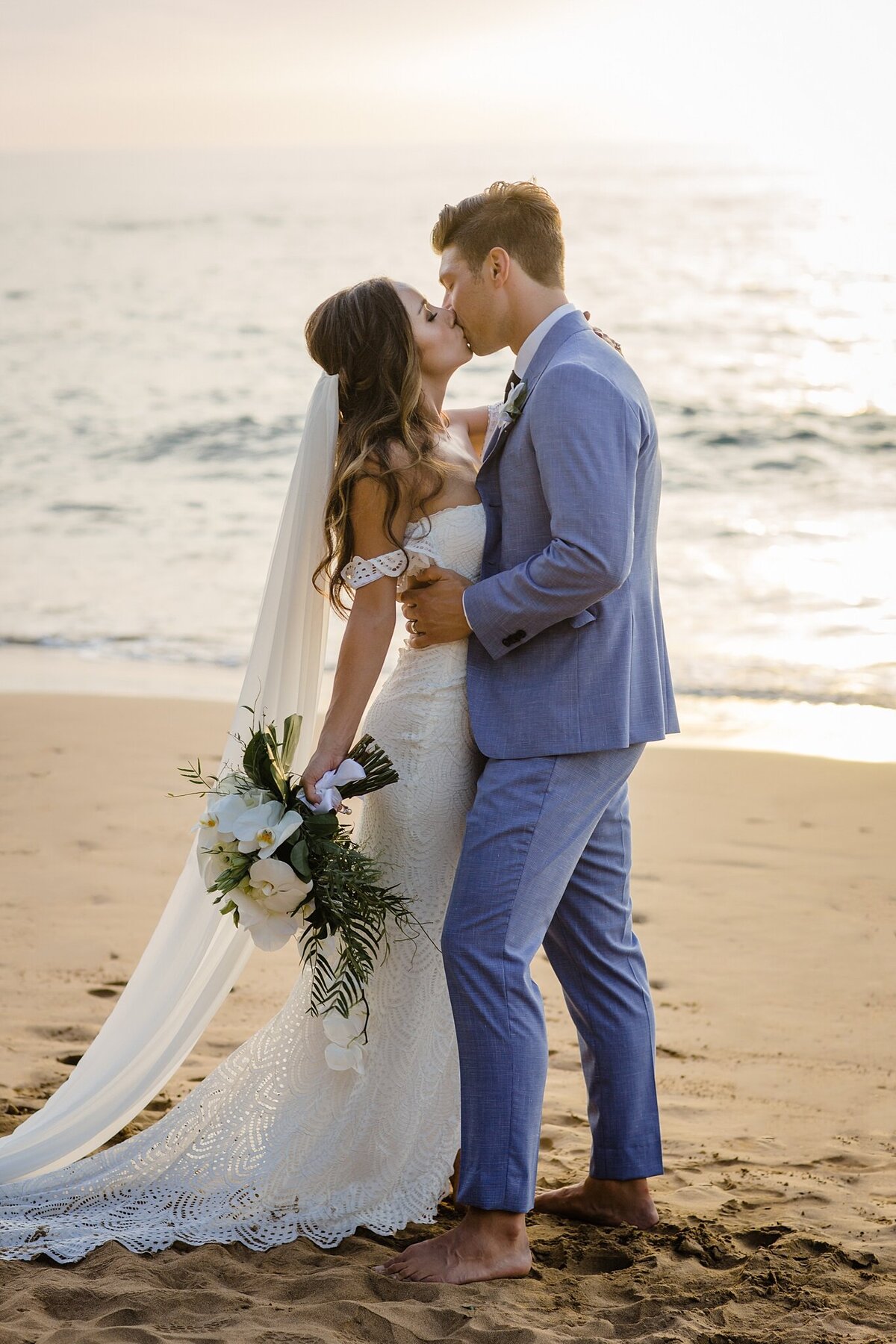 wedding kiss on the beach