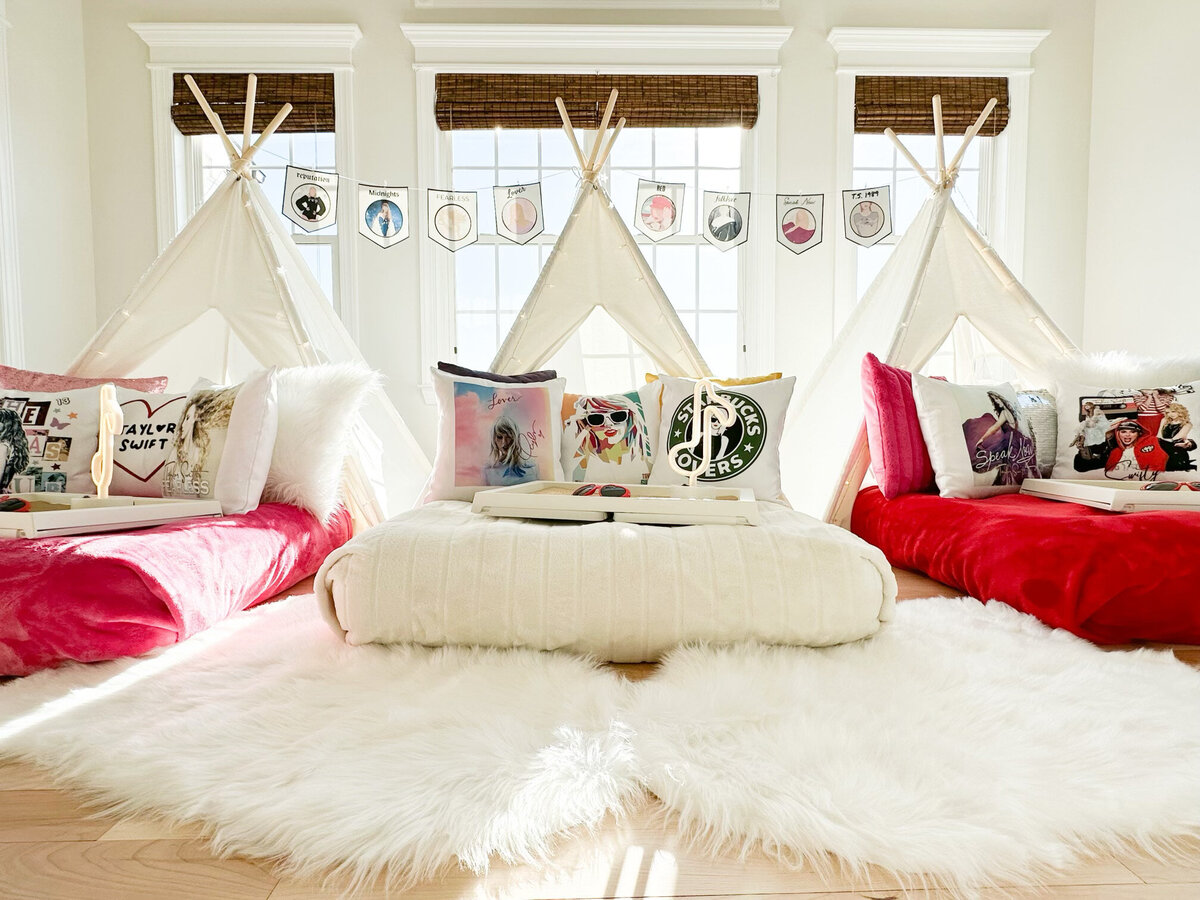 three teepee beds with taylor swift themed pillows