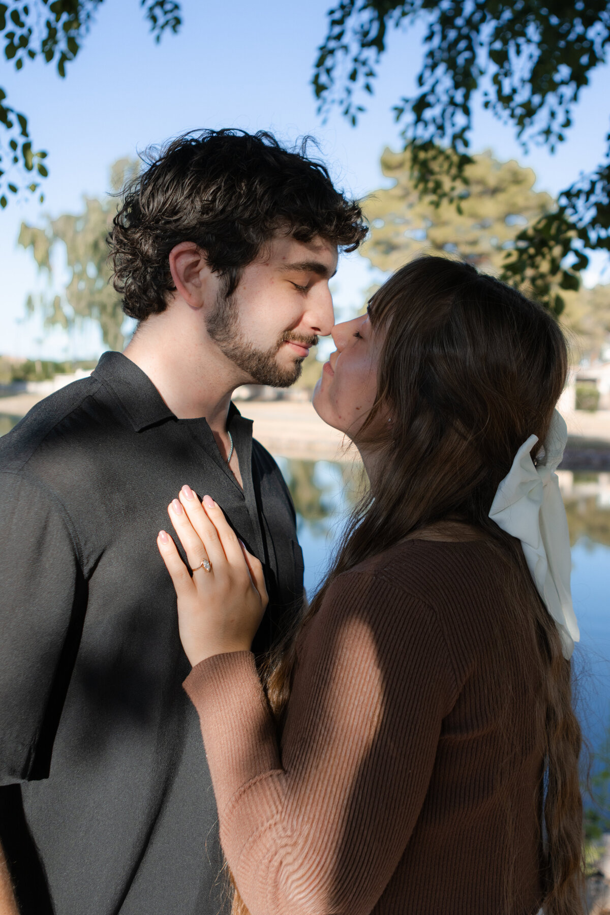 Jovanna G Photography. Classic, sophisticated Wedding Photos. Soft romantic engagement photos. Soft romantic WeddingPhotos. Sophisticated Wedding Photographer. Professional Wedding Photographer. Destination Wedding Photographer. Luxury Wedding photographer. Traveling Wedding Photographer. AZ Wedding Photographer. Gilbert AZ Wedding Photographer. Queen Creek Wedding Photographer. Phoenix Wedding Photographer. Scottsdale Wedding Photographer. Flagstaff Wedding Photographer. SoCal Wedding Photographer. California Wedding Photographer. Northern California Wedding Photographer. Southern California Wedding Photographer. San Francisco Wedding Photographer. Bay Area Wedding Photographer. San Jose Wedding Photographer. Golden Gate Bridge Wedding Photographer. Beach Lover Wedding Photographer. Palace of the Fine Arts Wedding Photographer. Ocean Lover. I love California. Orange County Wedding Photographer. Newport Beach Couples Photographer. Newport Beach Wedding Photographer. Laguna Beach Couples Beach Engagement Photographer. Laguna Beach wedding beach photographer. Los Angeles Wedding Photographer. Young and in love engaged couples who live in southern California. Christian Young Couple. Young Engaged Couple. Engaged High School Christian Couple. Christian Values. Young conservative Christian women. Young Conservative Christian men. Young Conservative Christian Couple. Young Christian Couple Engaged in High School. Young Christian College Couple. Lakeside Lovers in the Autumn Sun. David & Grace - engagement photos. Jovanna G Photographer Engagement Photos. Arizona sun shining through autumn trees- engagement. Chandler, AZ Engagement Photos. Chandler, AZ 2026 bride. Chandler, AZ Wedding Photographer. Chandler, AZ Young Engaged Couple. Girl in her 20s. Engaged Arizona Girl in her 20s. Lakeside Engagement photos. AZ Lakeside Engagement Photos. AZ Weeping Willow Lakeside Proposal. Arizona Lakeside Proposal with weeping willow tree. Detail shot of engagement ring on Arizona Lakeside estate. Chandler, AZ Lakeside Estate Proposal Outfit Inspiration.