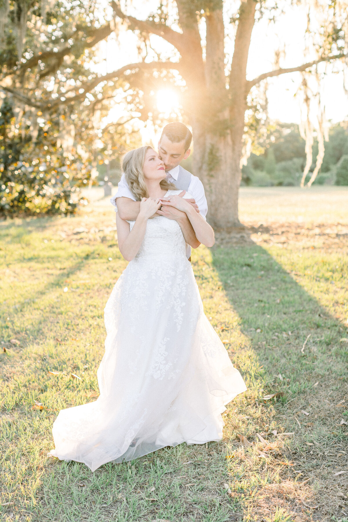glowy wedding sunset portraits of bride and groom 