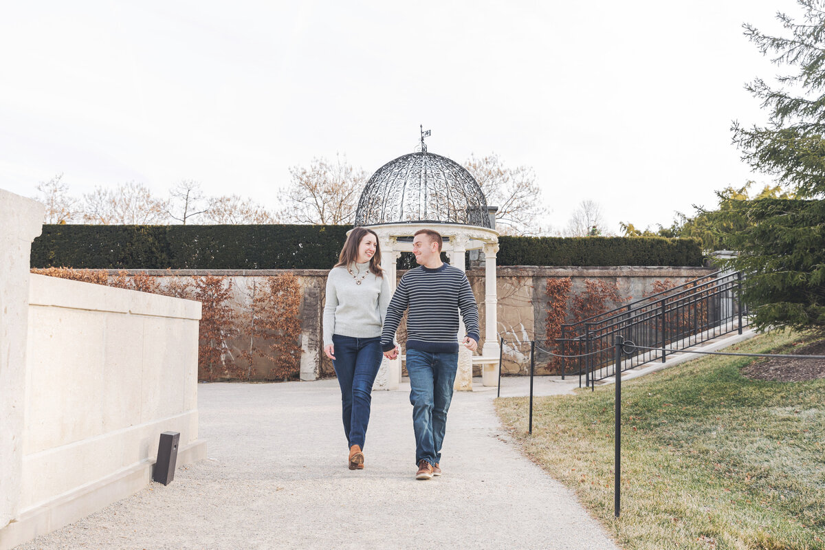 engaged couple walking longwood gardens, kennett square, Pa